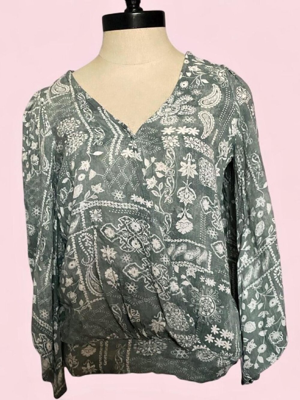 Light green/gray & white paisley print top with bell sleeves and low cut back